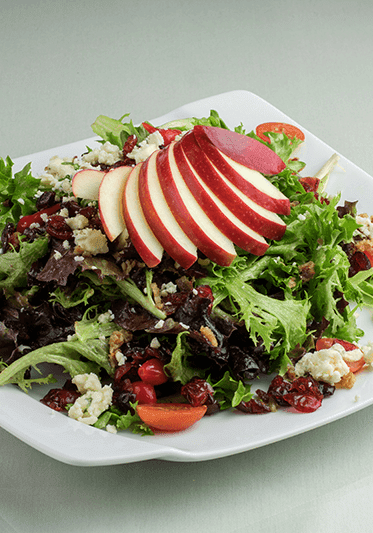 Features seasonal apples, Rogue Creamery Blue, bacon, cranberries & cherry tomatoes tossed in our house made apple champagne vinaigrette.
